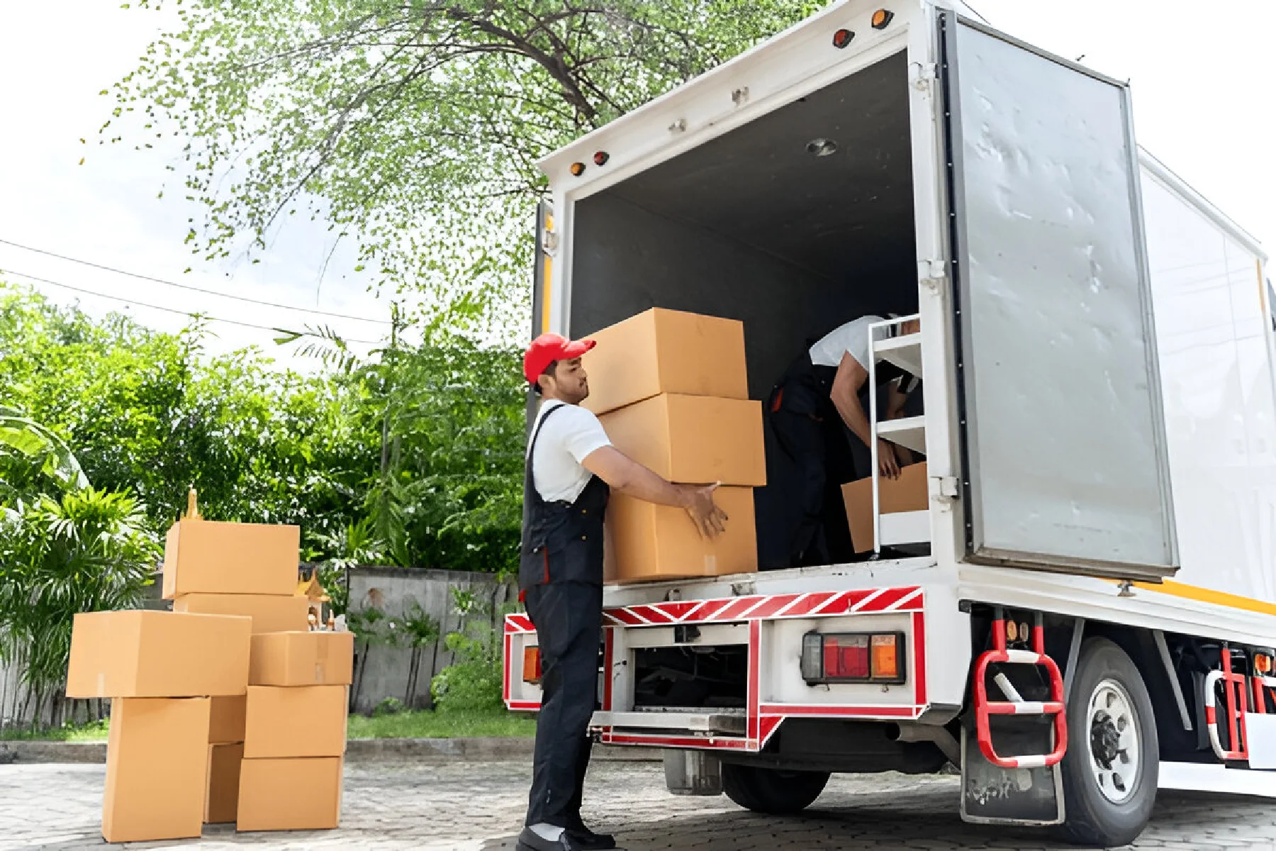 Professional movers handling furniture with care