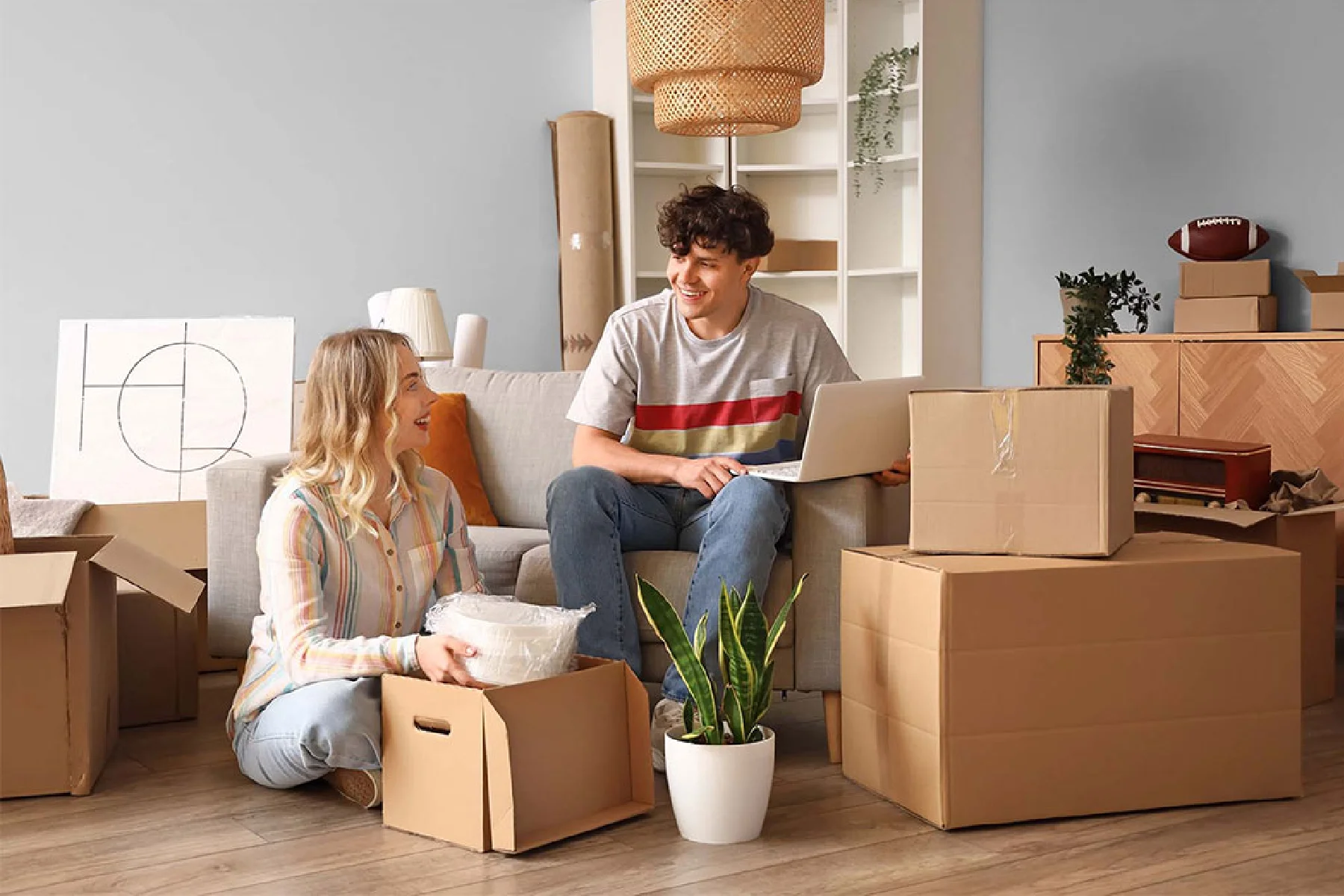 Professional movers in a modern home
